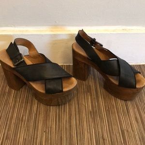 Free People wooden platform shoes.